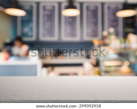 counter top with bakery shop blurred background