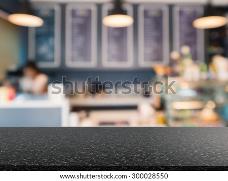 counter top with bakery shop blurred background
