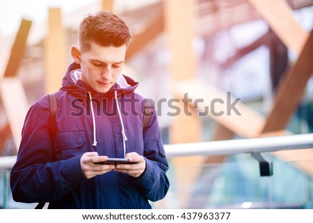 Handsome man cell phone call smile outdoor city street, Young attractive guy casual blue shirt use smartphone