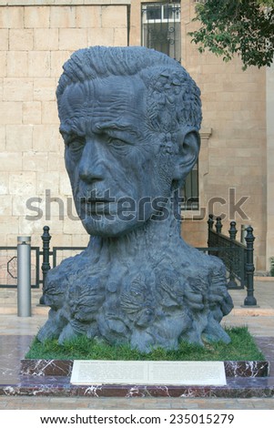 BAKU, AZERBAIJAN - SEPTEMBER 8, 2013: monument of Vahid Aliaga as head with charachters of his works instead hair in Baku, Azerbaijan on 8th September, 2013
