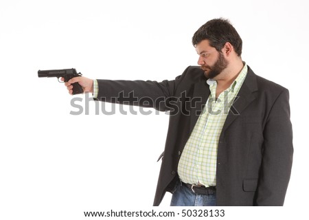 stock photo suited guy pointing a gun