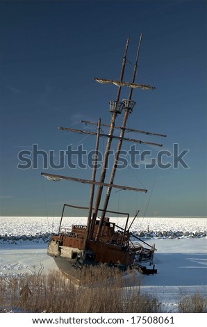 A shot of a shipwreck - frozen in time in the ice and snow