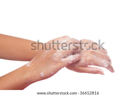 Scratching back of hand with finger nails and soap, part of the steps to prevent spread of influenza
