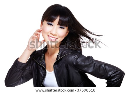 stock photo : Hot, sexy, Chinese biker chick dressed in black leather jacket 