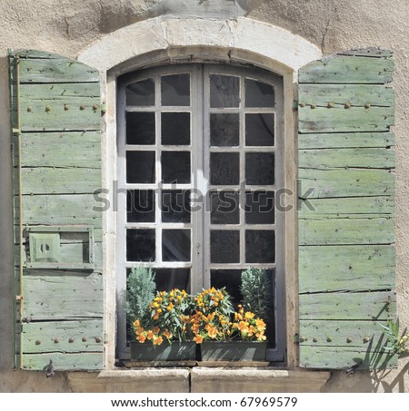 Window and shutters in old house, Provence, France