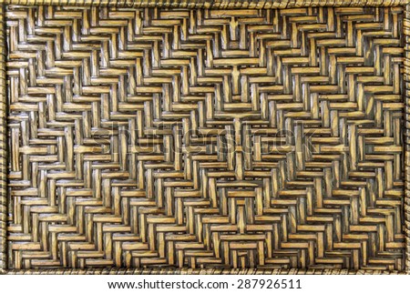 brown woven rattan background, close up  woven rattan bag, products from thailand