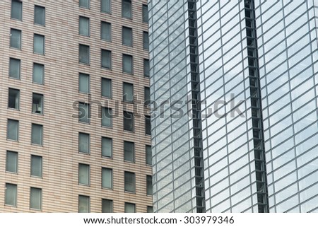 close up glass and stone wall building - Modern Office Building in tokyo, japan