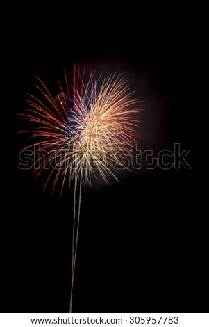 Beautiful colorful holiday fireworks in new year celebration on isolated background