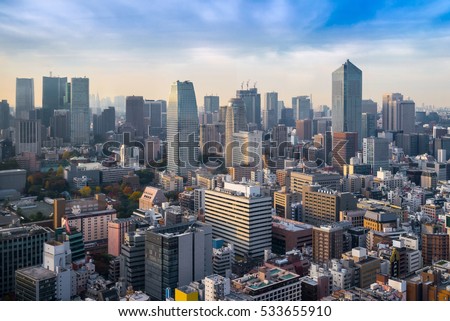 Cityscapes of tokyo in Fog winter, Skyline of Tokyo, office building and downtown of tokyo in minato, Japan, Tokyo is the world\'s most populous metropolis, command centers for world economy.