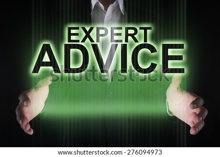 Businessman holding a glowing text expert advice. business concept.
