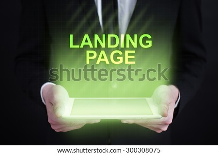 Businessman holding a tablet pc with \