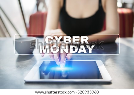 Woman using tablet pc and selecting cyber monday.