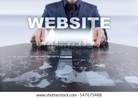 Businessman using tablet pc and selecting website.