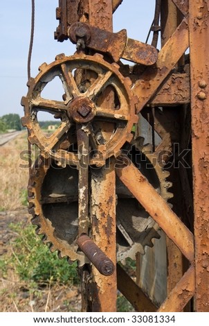 side of old rusty machinery; strong contrast