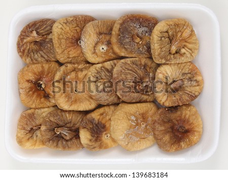 High angle view of a supermarket tray of dried figs