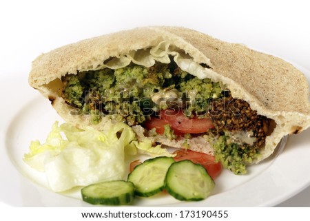 Egyptian flat bread stuffed with salad and falafels, a traditional fast food in the Middle East
