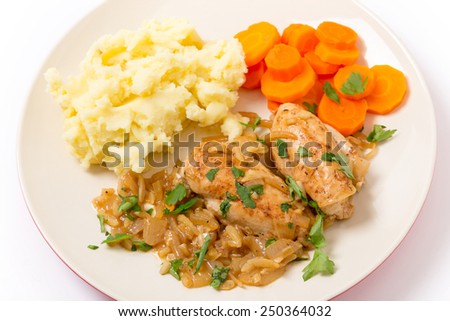 Chicken breasts in an almond, onion and wine sauce, served wth mashed potatoes and carrots