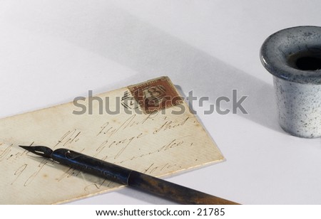 A British Victorian letter, from the 1850s, with a pen and inkpot.