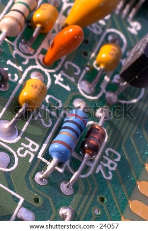 Components on a circuitboard from a 1989 286-model computer. Macro.