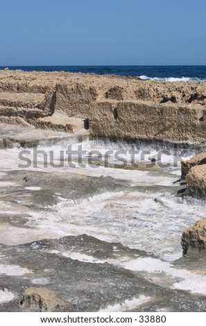 Man-made salt-pans at Stavros, Akrotiri, Crete. Such pans have been used in salt-making at least since Roman times and perhaps from Minoan.