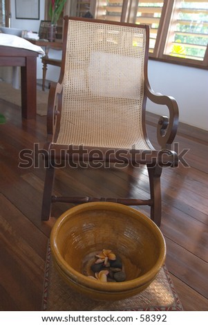 Foot massage basin and chair in an exclusive tropical spa.
