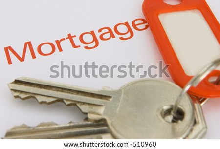 Keys with a paper with the word mortgage on it, max depth of field.