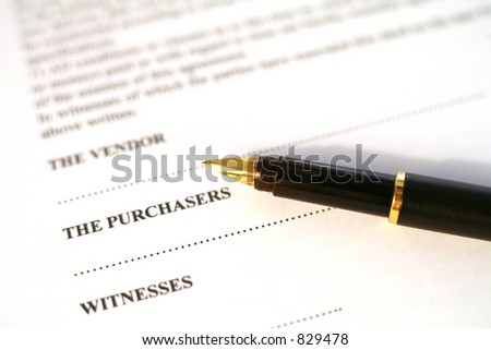 A gold-nibbed fountain pen resting on a contract for the purchase of property in the EU