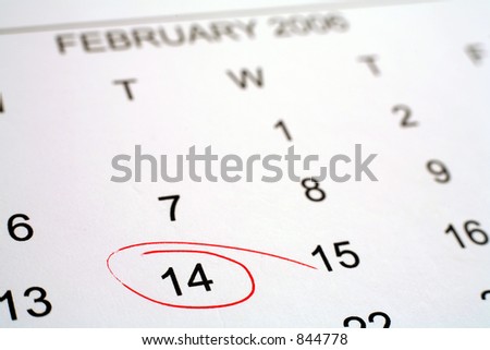 Calendar with Valentine\'s day (2006) ringed in red. Shallow depth of field.