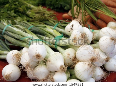 Spring onions and carrots on a farmer\'s stall in Crete