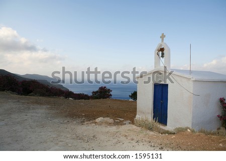The Isolated chapel of St Irini, which is next to a water source on the arid Gramvousa Peninsula, Crete. The church is surroun