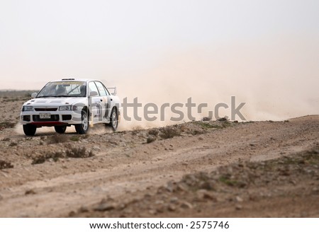 Dane Henson and Mohammed al-Marri placing fifth in Round 1 of the NBK Qatar Rally 2007 at Losail, Qatar, January 27, 07.
