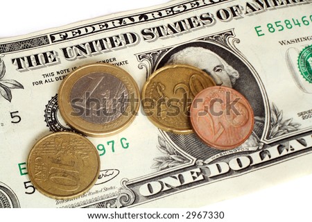 A one dollar bill with euro coins totalling E1.32 - roughly equal in value to the US currency.