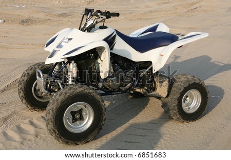 A quad bike in the desert in the Arab Gulf.