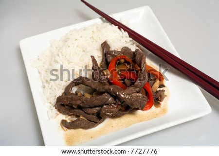 Asian style stir-fried beef and veg with white rice.