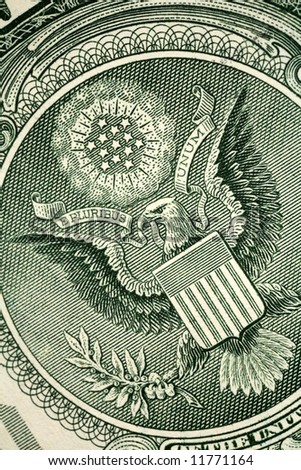 Macro of the engraving of the Great Seal of the US that is printed on American banknotes, with the inscription E Pluribus Unum (Out of many, one).