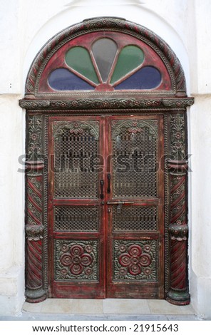 A traditional, ornate Arab door in a building in Souq Waqif, Doha, Qatar.