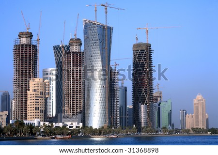 A view of towers unders construction in Doha, Qatar, on December 30, 2008. The Arabian Gulf emirate has been in the grip of a construction boom, fuelled by high energy prices