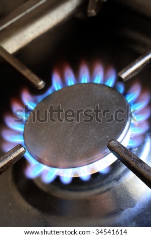 Flames on the ring of a domestic gas cooker