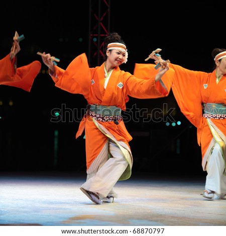 DOHA, QATAR - JANUARY 8: Japanese dancers perform at a cultural event in Doha, Qatar, January 8, 2011, as part of the host nation\'s Asian Cup celebrations.