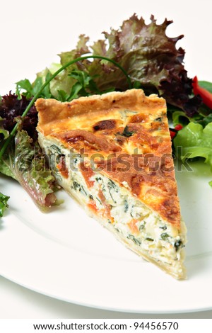 A delicious quiche made from spinach beet (aka Swiss chard or sea kale beet), leek and tomato, served with a garden fresh salad.