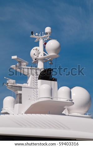 Navigation system antennas of big white motor yacht