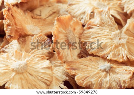 Closeup of dried sliced pineapple. Ecological food. Viewpoint from above.