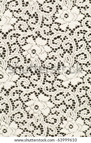 White textile background with stylized flowers pattern