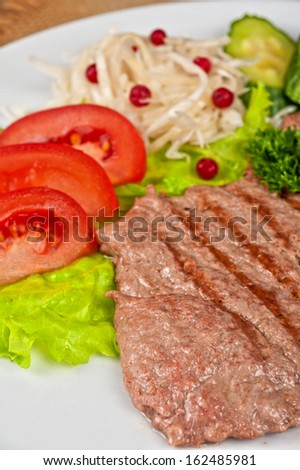 dish of meat chop with vegetable