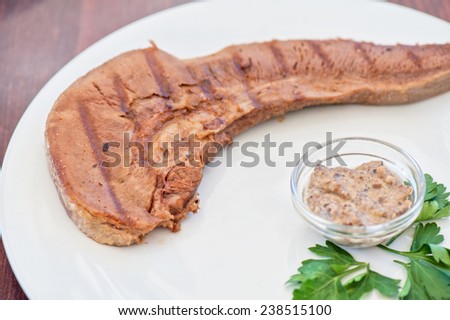 Boiled beef tongue with sauce