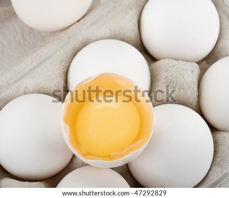 Eggs closeup with one egg is broken