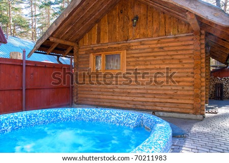 Wooden house of russian baths and hot whirlpool