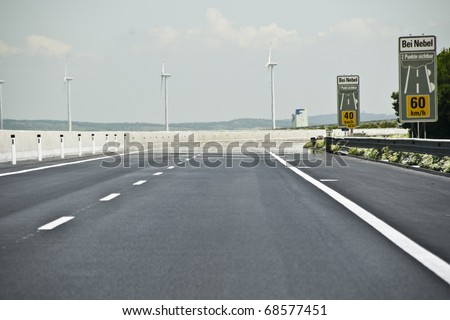 Empty motorway in summer with strong heat haze