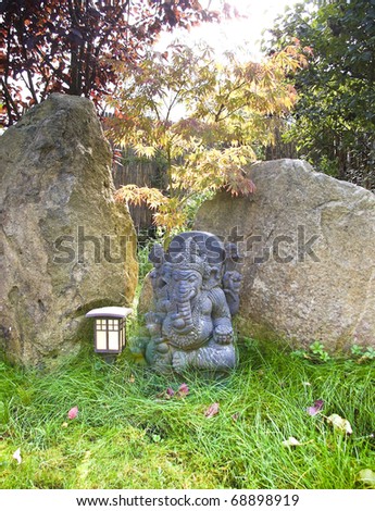 Indian ganesh figure, photographed in the garden of an ayurveda and yoga center.