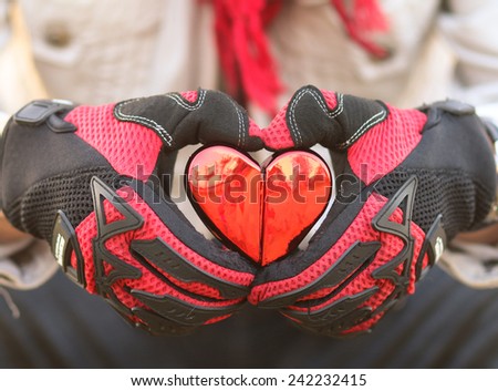 man in love biker glove hand heart red